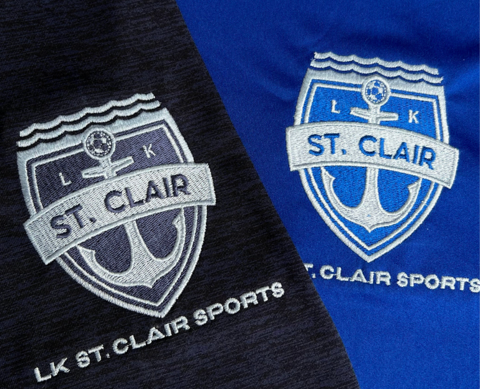 'LK St. Clair' embroidered on sports polos